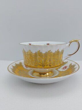 Paragon Yellow Gold Trenton Footed Tea Cup & Saucer Set England